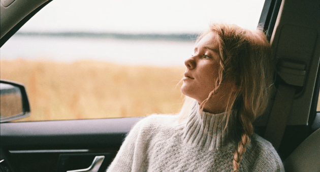 young-woman-sitting-car