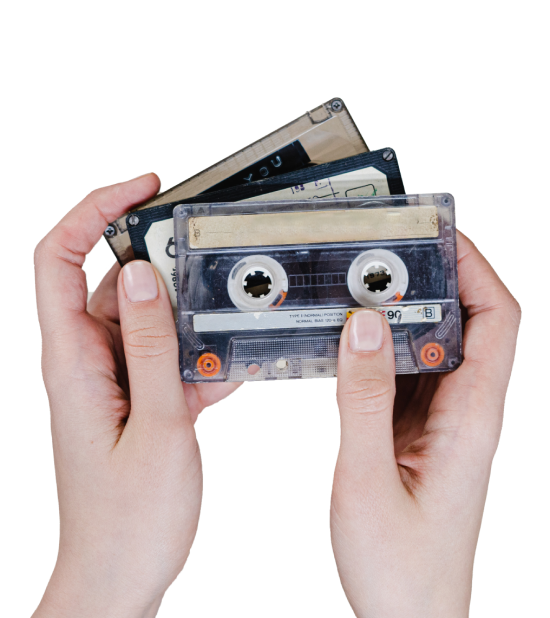 hands-holding-cassette-tapes